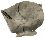 "Two Views of the following Helmet A Fine Close Helmet, With Embossed Decoration"